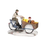 kerstdorp-bakfiets-familie-FUWlrmXv-0.webp